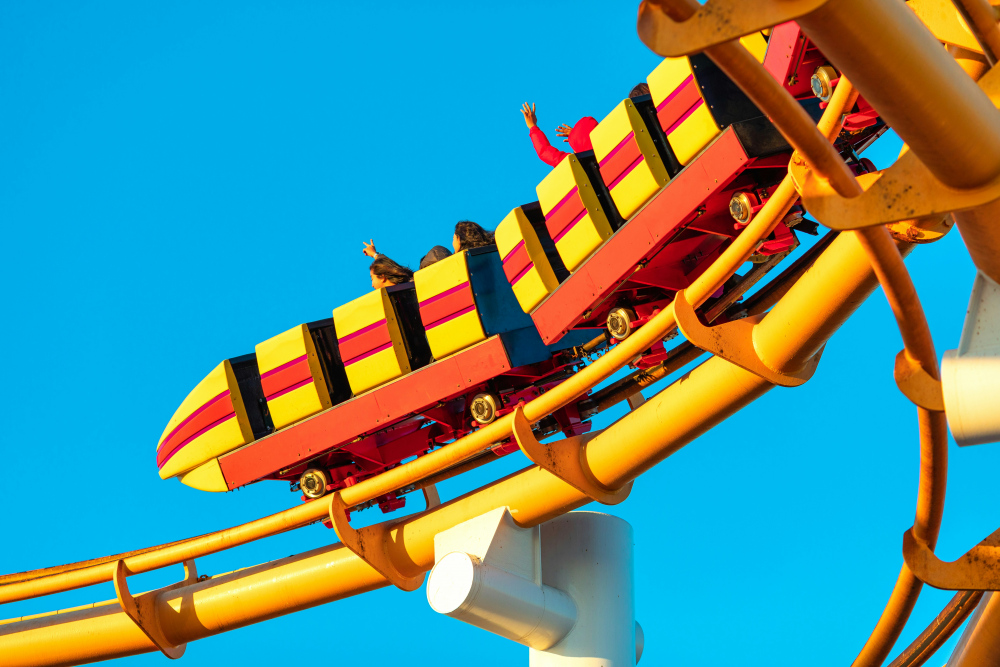 How Do Roller Coasters Stay on the Tracks? The Science Behind the Thrills